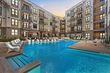 Lenox burnet apartments in austin, texas pool with lounge chairs